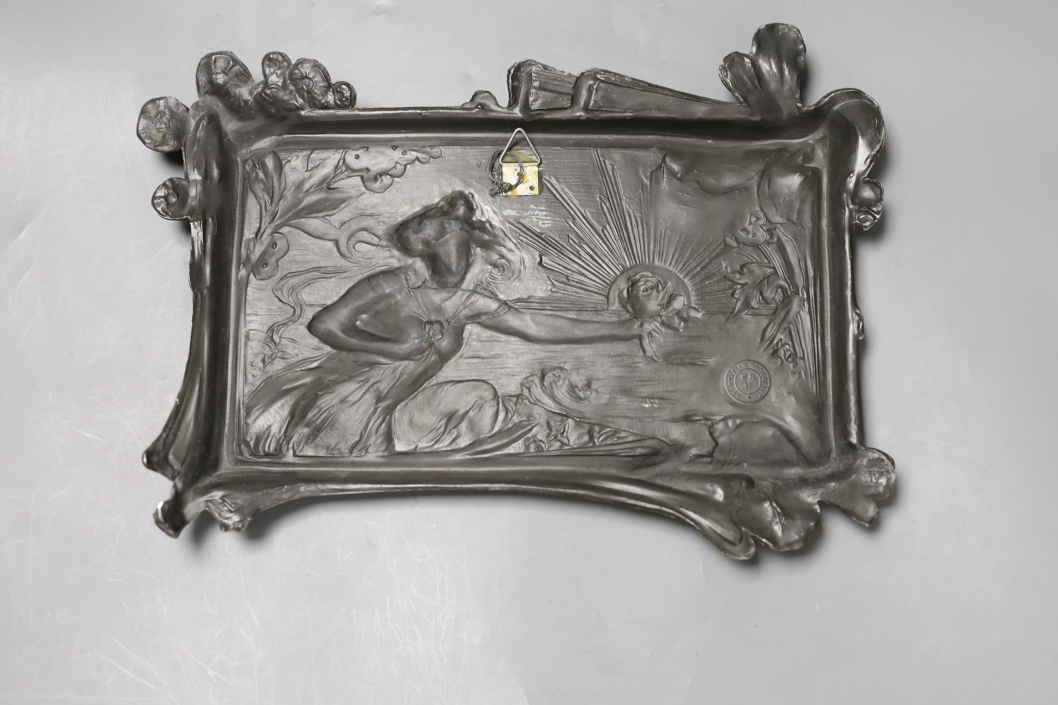 Two WMF plaques and another Art Nouveau plaque stamped gesetzlich geschützt H M R